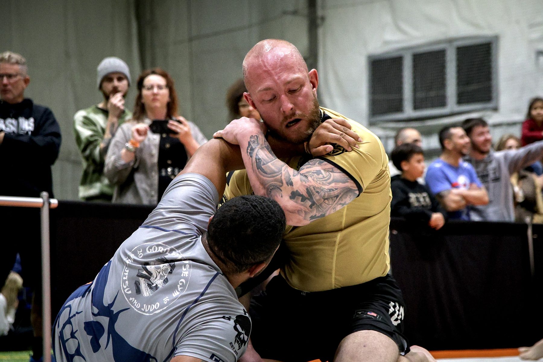 Tom K. competing in a jiu jitsu match